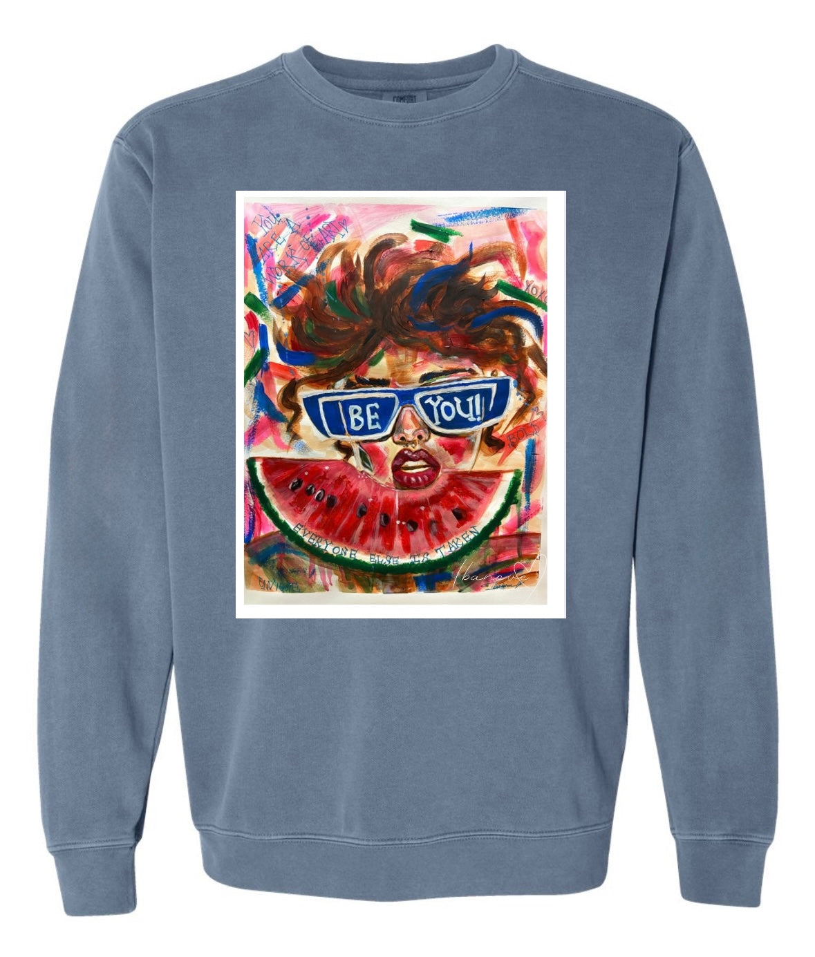 Be Bold blue sweat shirt featuring woman with sunglasses and wild hair on colorful background with watermelon fruit in front and text "you're a work of art" - front view
