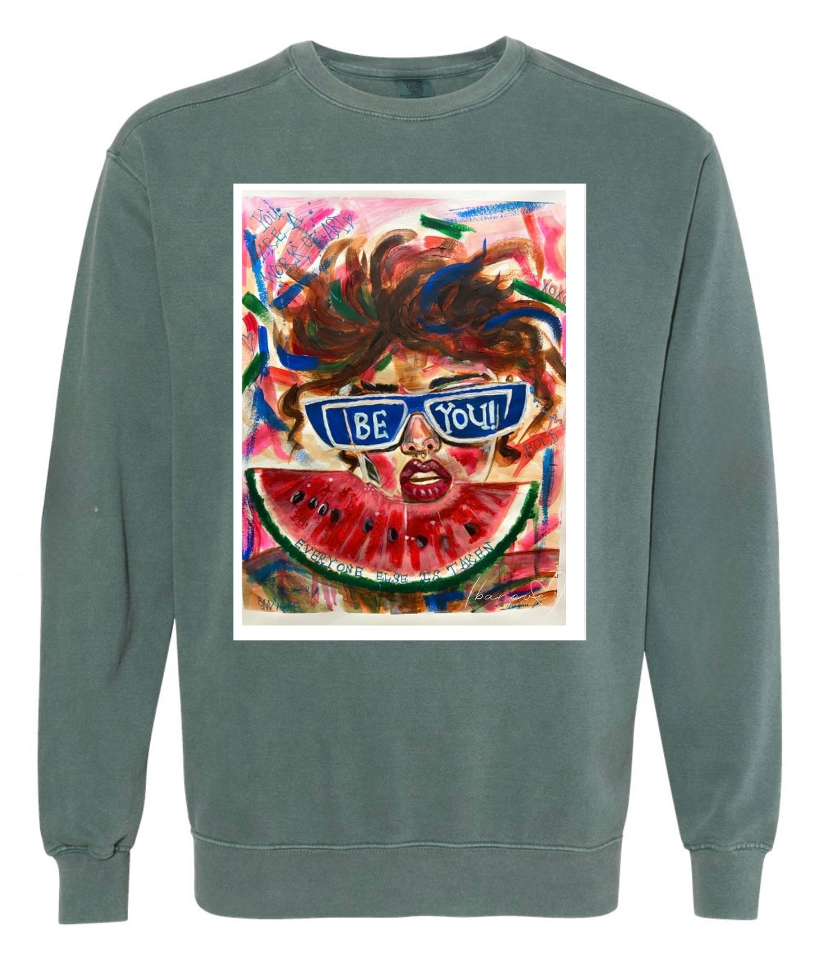 Be Bold green sweat shirt featuring woman with sunglasses and wild hair on colorful background with watermelon fruit in front and text "you're a work of art" - front view
